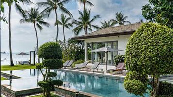 Outdoor pool, pool umbrellas, pool loungers