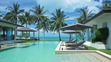 Outdoor pool, pool umbrellas, sun loungers