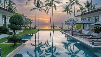 Outdoor pool, pool umbrellas, pool loungers