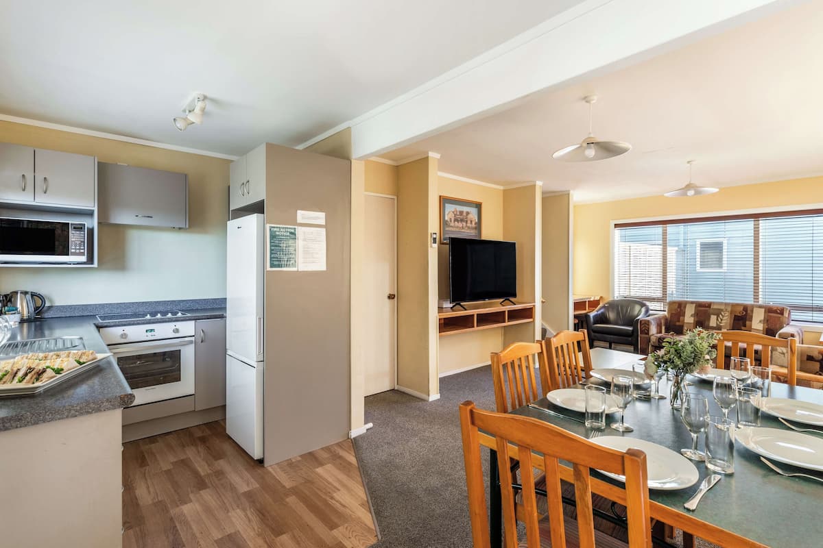 economy apartment | living area | smart tv