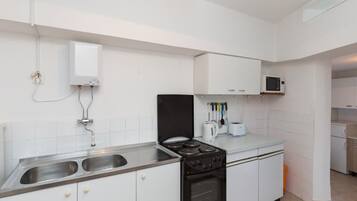Apartment (1 Bedroom apt, balcony, sea view) | Private kitchen | Fridge