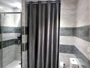 Shower, free toiletries, hair dryer, towels