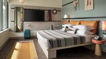 Premium bedding, pillow-top beds, desk, laptop workspace