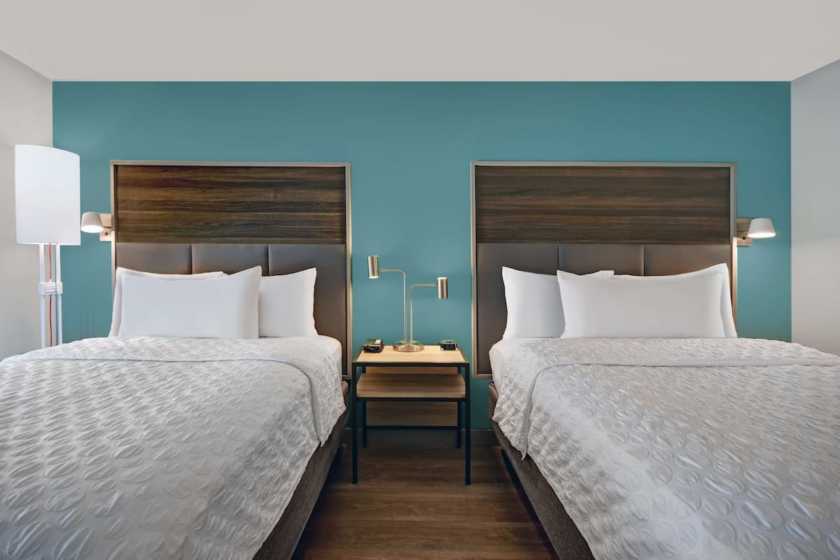 desk, laptop workspace, blackout curtains, iron/ironing board