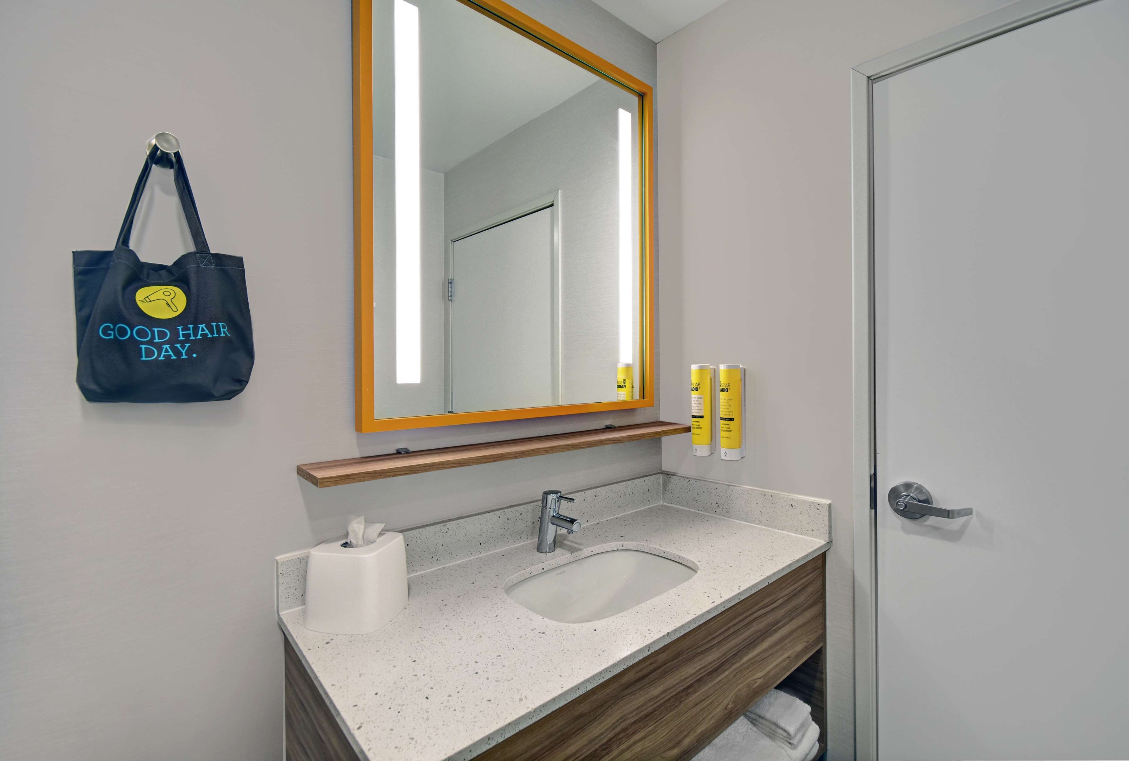 room, 2 queen beds | bathroom | hair dryer, towels, soap, shampoo