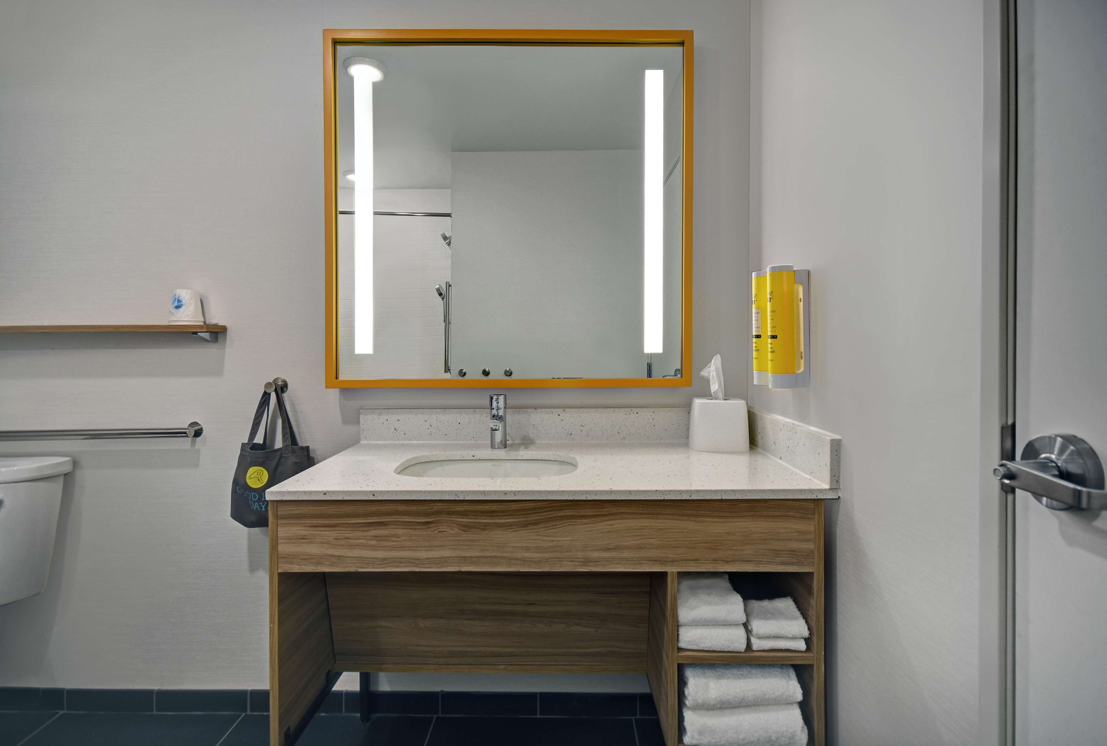 hair dryer, towels, soap, shampoo