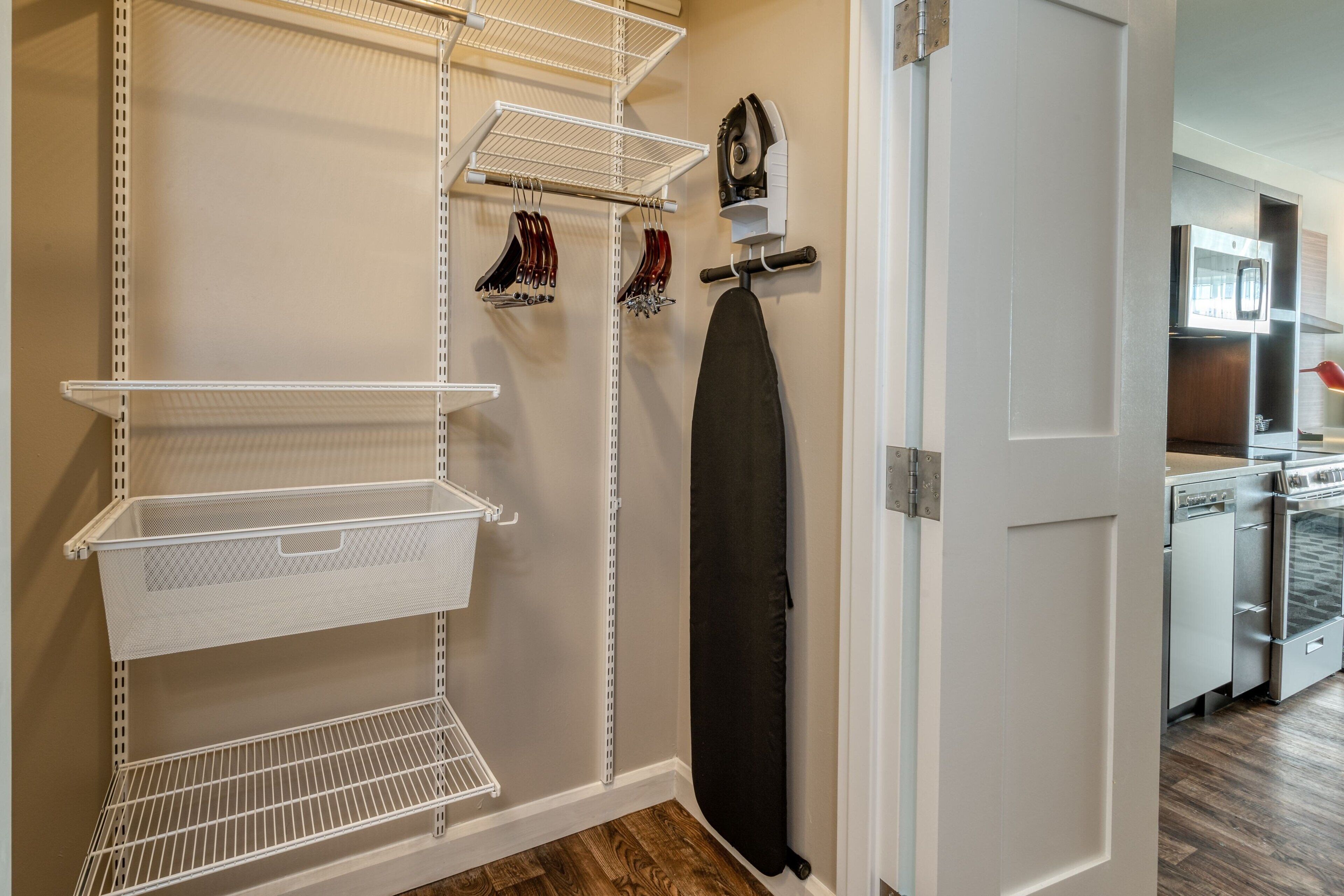 desk, laptop workspace, blackout curtains, iron/ironing board