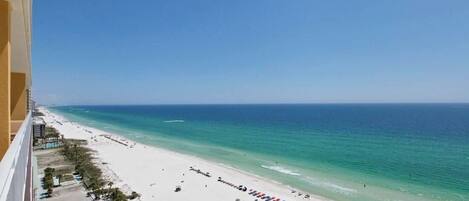 On the beach, sun-loungers