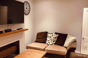 Casa | Zona de estar | Una chimenea