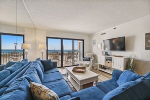 Flat-screen TV, DVD player - XPLORIE ACTIVITIES & LINENS INCLUDED*! PLAZA 104 features an open-concept Den; Kitchen; Dining/Living Room area.  Oceanfront Balcony. (Ocean City)