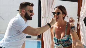 Outdoor pool, open 9:00 AM to 10:00 PM, free pool cabanas