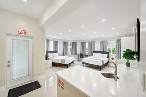 4 bedrooms, desk, iron/ironing board, travel cot