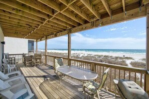 Enjoy a meal on the deck with a view of the beach, where you can grill and take in the ocean scenery.