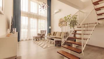 Family Penthouse | Living area | 120-cm Smart TV with cable channels, TV, Netflix