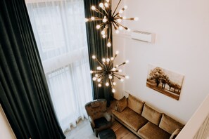 Family Penthouse | Living room | 120-cm Smart TV with cable channels, TV, Netflix