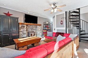 Smart TV, fireplace, DVD player, books