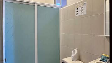 Shower, free toiletries, hair dryer, towels
