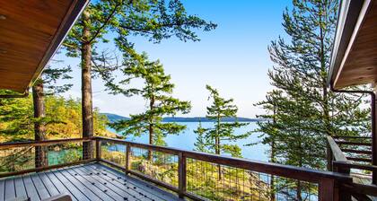 Rustic waterfront cabin w/ free WiFi, a full kitchen, & furnished decks