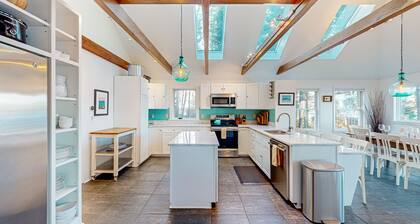 Amazing waterfront home with private deck, views, private dock, & fireplace