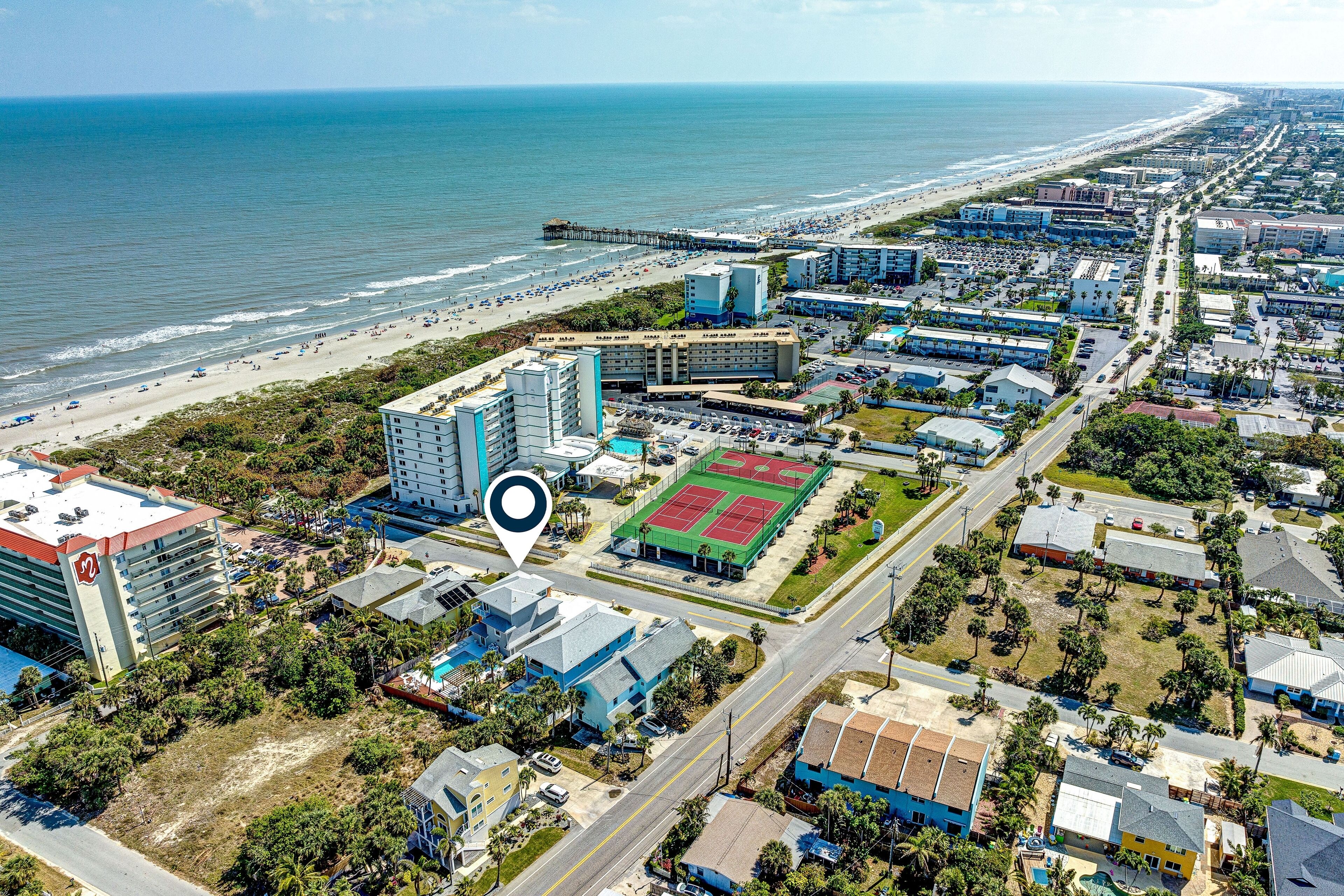 Spectacular 3-story ocean-view beach house with full-size pool & firepit