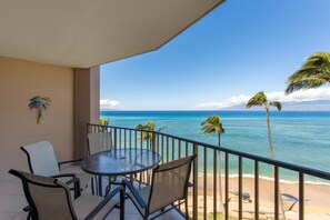 Outdoor dining - Oceanfront sixth-floor condo w/water views, balcony, washer/dryer, shared pool (Lahaina)