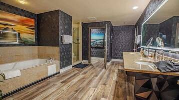 Bathtub, hair dryer, towels, soap