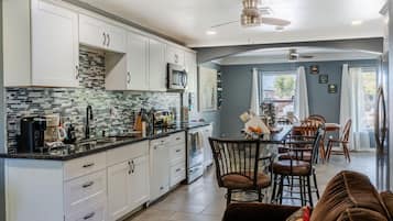 Coffee/tea maker, fridge, microwave, oven