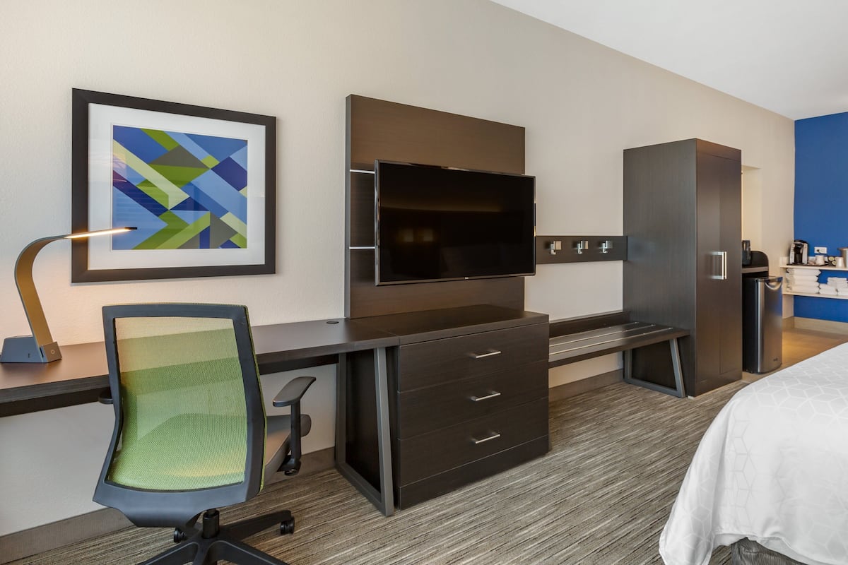 Desk, laptop workspace, blackout drapes, iron/ironing board
