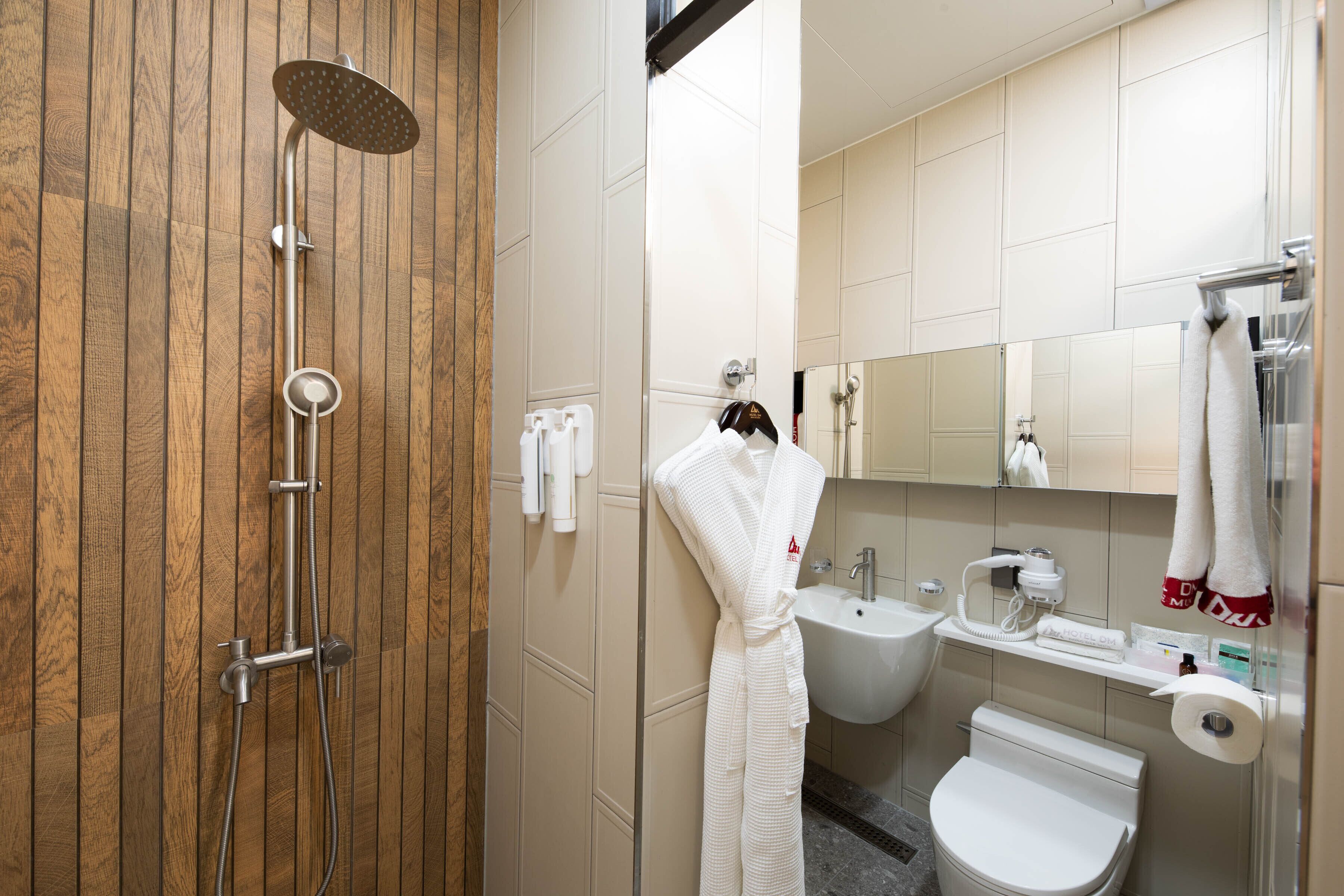 superior family room | bathroom | free toiletries, hair dryer, bathrobes, slippers