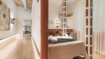 Habitación económica doble | Edredones de plumas, minibar, decoración individual