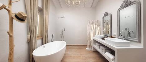 Bathtub, hair dryer, towels
