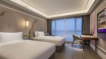 Frigobar, quartos à prova de som, Wi-Fi de cortesia