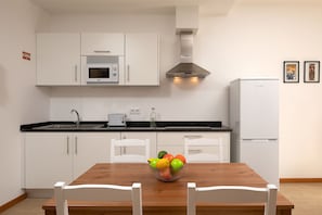 Fridge, microwave, coffee/tea maker, electric kettle