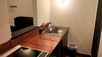 Fridge, microwave, cookware/dishes/utensils