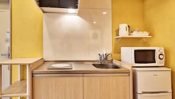 Fridge, microwave, cookware/dishes/utensils