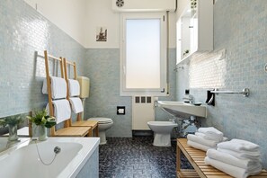 Apartment, 2 Bedrooms | Bathroom | Combined shower/tub, rainfall showerhead, hair dryer, bidet