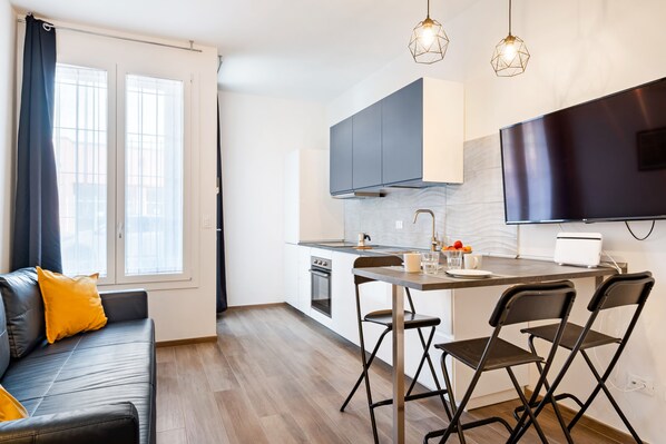 Apartamento, 1 habitación | Cocina privada | Frigorífico grande, horno, placa de cocina y lavavajillas