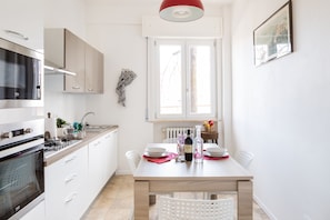 Apartment, 2 Bedrooms | Private kitchen | Fridge, microwave, oven, stovetop
