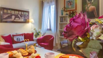 Apartment, 1 Bedroom | Living area | Flat-screen TV
