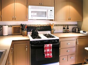 Microwave, stovetop, dishwasher, coffee/tea maker