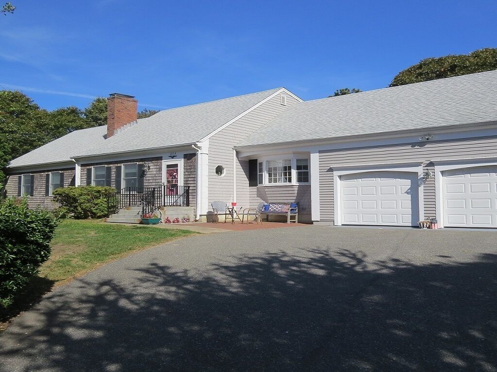 Dog friendly! Enjoy outdoor space with large yard, patio, and enclosed outdoor shower!