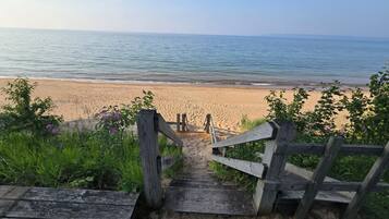 On the beach, sun loungers, beach towels