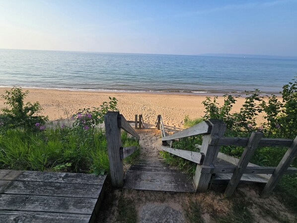 On the beach, sun-loungers, beach towels