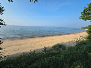 On the beach, sun-loungers, beach towels