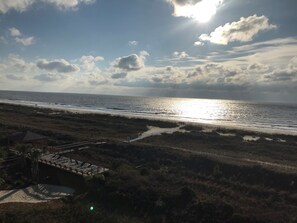 On the beach, sun loungers, beach towels
