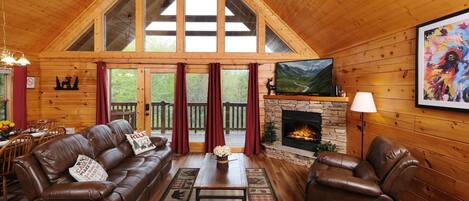 Tv, eldstad, dvd-spelare och bordsfotboll