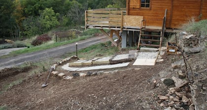 Wooden chalet in the heart of nature near a farm