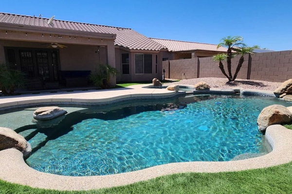 Private backyard with pool/spa combo. Heating optional with fee. BBQ and gas fire pit.