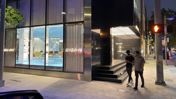 A modern building with large glass windows and a visible entrance. - Ohhh-Our sweet little surprise #TinyPoolHouse #MiamiDesignDistrict (Miami)