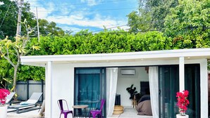 A modern outdoor pool area with a covered seating area, a pool, and a view of the surrounding greenery. - Ohhh-Our sweet little surprise #TinyPoolHouse #MiamiDesignDistrict (Miami)